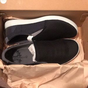 Merrell black slip-on sneakers.
